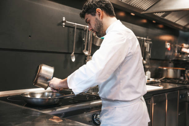 istock Chef preparing pasta in a luxury restaurant 1445692435