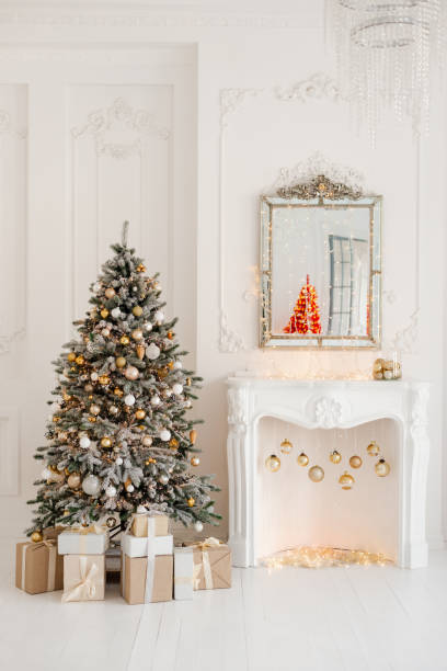 istock A beautifully decorated room with a Christmas tree with gifts underneath. 1445693555