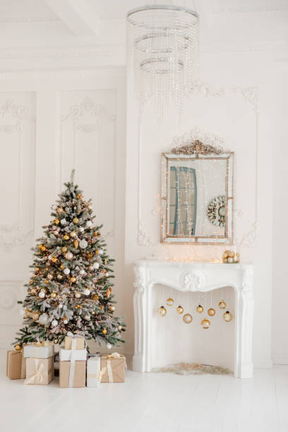 istock A beautifully decorated room with a Christmas tree with gifts underneath. 1445693558