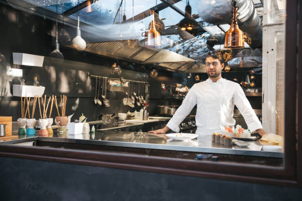 istock Young professional Chef in a fine dining restaurant 1445693651