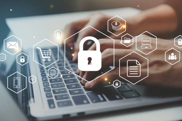 istock Businessman working on laptop with security online business icon. 1445696352