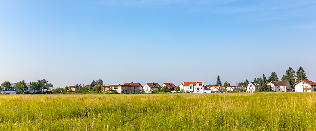 new housing area near the meadow in beautiful landscape in Munich