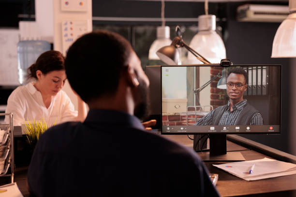 istock Employee talking with project manager speaking on corporate videocall 1445700790