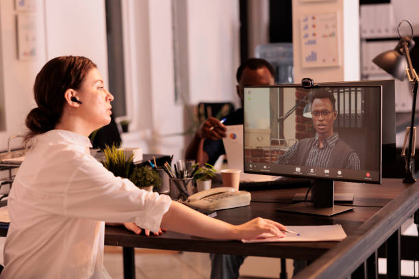 istock Company ceo listening to employee project plan on videocall 1445700843