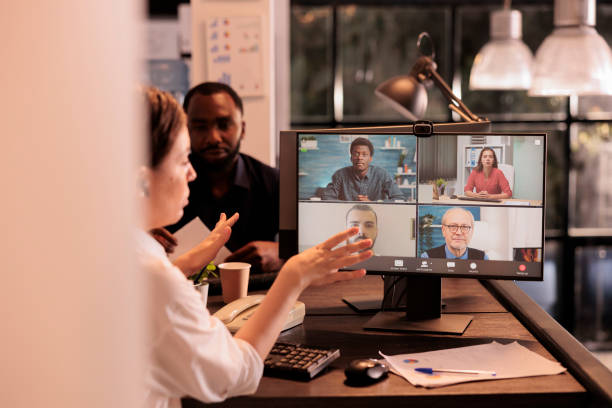 istock Corporate team discussion report presentation on videocall meeting 1445701896