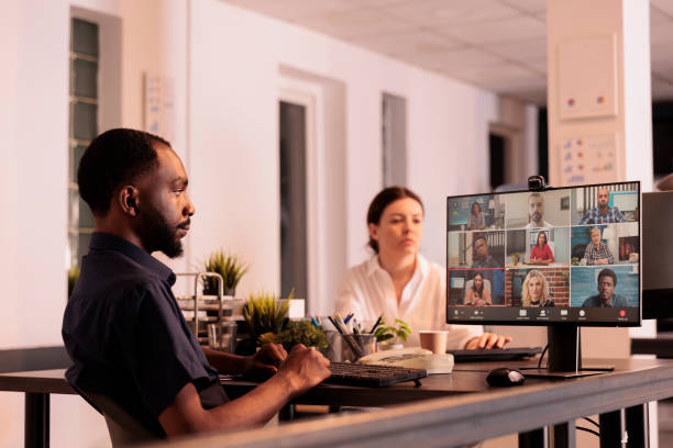 istock Employee talking with colleagues on online meeting 1445702088