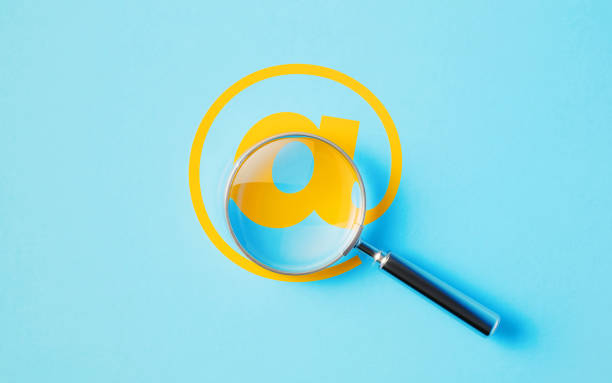 istock Magnifier And Yellow At Symbol On Aquamarine Background 1445702205