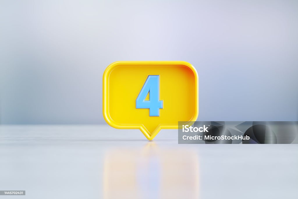 Yellow Speech Bubble Shape With Blue Number 4 Sitting Before Silver Defocused Background Yellow speech bubble with blue number 4 sitting on before silver defocused background. Horizontal composition with copy space. Number 4 Stock Photo