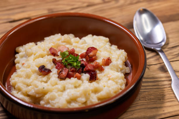 istock Slovakian halusky served with sheep cheese and roasted bacon 1445703526