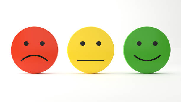 istock Plastic smiley faces to express sad, neutral and happy feedback 1445704258