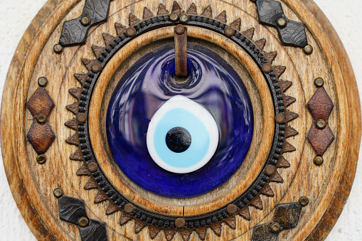 Turkish blue eye. Traditional Turkish national decoration and amulet for good luck and protection. Blue glass eye is used in interior decorations. High quality photo