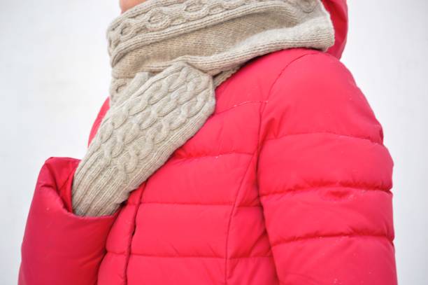 istock girl in winter clothes 1445706814