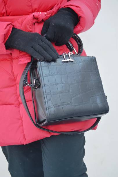 istock girl with handbag 1445707118
