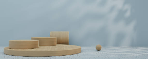 istock 3D rendering, Brown wood podium, Cosmetic display stand on blue background. presentation backdrop. 1445710625