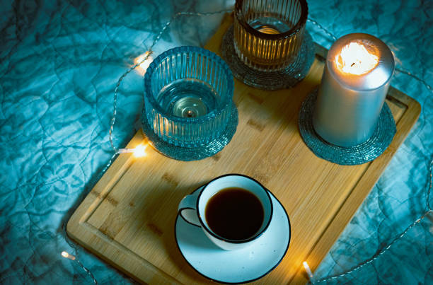 istock Cup of coffee with turk on Christmas decorations lights background 1445711966