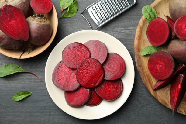 istock Fresh chopped beets on gray wooden table 1445712281