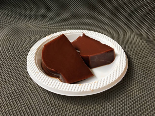istock Homemade delicious chocolate pudding in white plate isolated white background 1445715308
