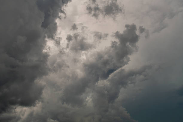 istock Gray storm clouds before the rain starts in the summer. 1445715587