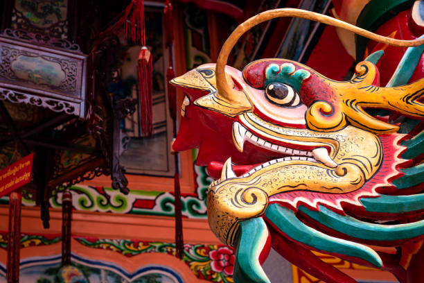 Beautiful dragon statue in Thai temple. Beautiful dragon statue in Thai temple. Characteristic temple image in Tahiland. Chinatown in Bangkok, Thailand. Stone dragon. dragon in chinese temple stock pictures, royalty-free photos & images