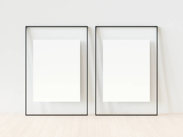 istock Close up white vertical photo frame on white wall background. Empty black picture frames mockup template isolated on white wall indoors. Vector illustration. 3d illustration 1445717513