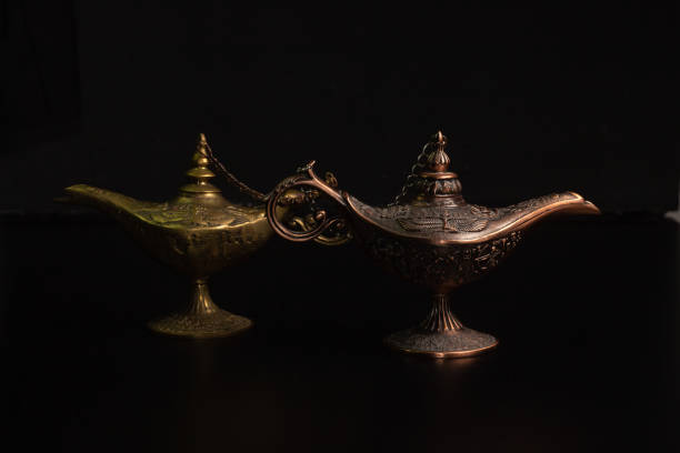 istock Aladdin's magic lamp isolated on black background 1445717764
