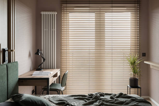 istock Bedroom with desk and big window 1445719422
