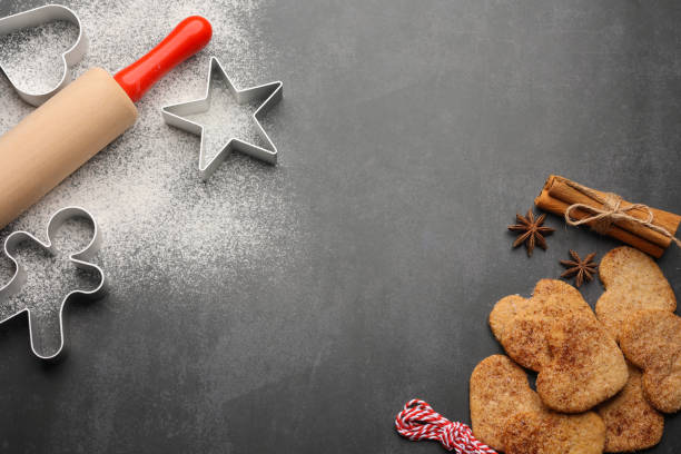 istock Baking Christmas cookies. Dark background 1445726171