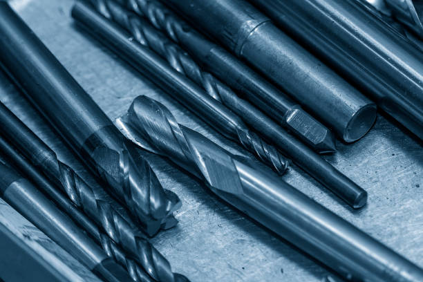 istock Close-up scene the group of used solid end mill cutting tools for CNC milling machine. 1445730247