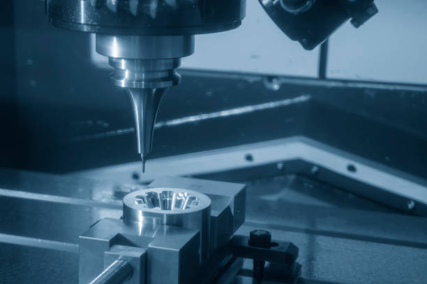 istock The CNC milling machine cutting injection mold part by solid ball end mill tool. 1445730299