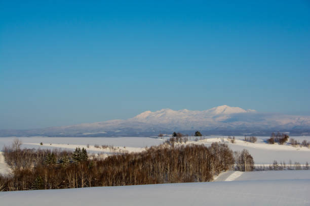 istock Hills and snowy mountains on a clear winter day 1445730645
