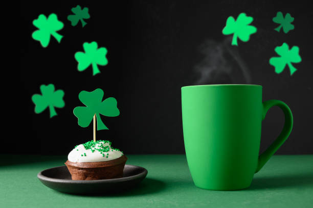 istock Irish coffee in green cup and special cupcakes for St Patrick s Day. 1445736237