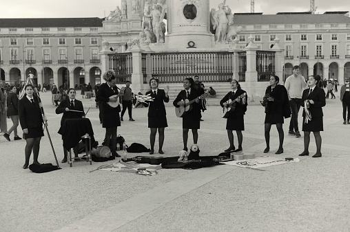 Lisbon, Portugal - February 26, 2022: College students perform at the Praça do Comércio Square in Lisbon downtown.