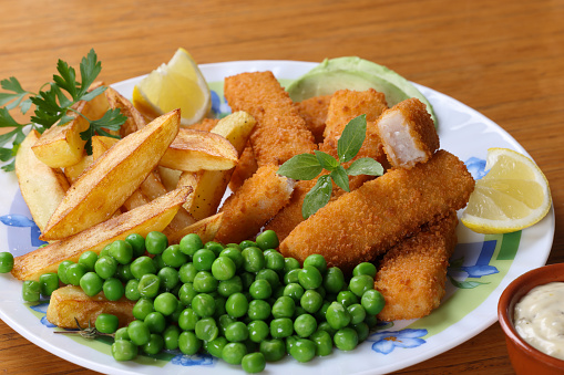 Freshly fried fish fingers