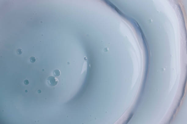 istock Texture of white shower gel as background, top view 1445743981