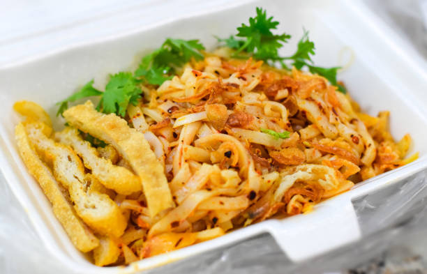 istock Myanmar traditional or classic white flat noodle salad called Khauk Swe Thoke 1445746676