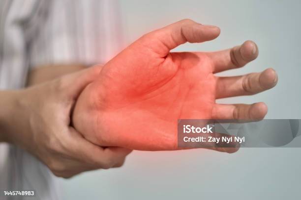 Painful Palm Of Asian Man Concept Of Compartment Syndrome Cellulitis And Hand Muscles Pain Stock Photo - Download Image Now