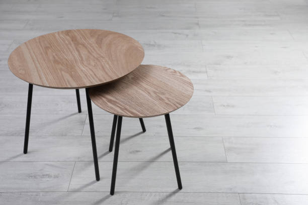 istock Empty wooden nesting tables indoors, space for text. Stylish furniture 1445750685