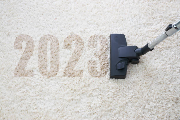 istock 2023 New year home cleaning with vacuum cleaner and copy space for a text 1445751982