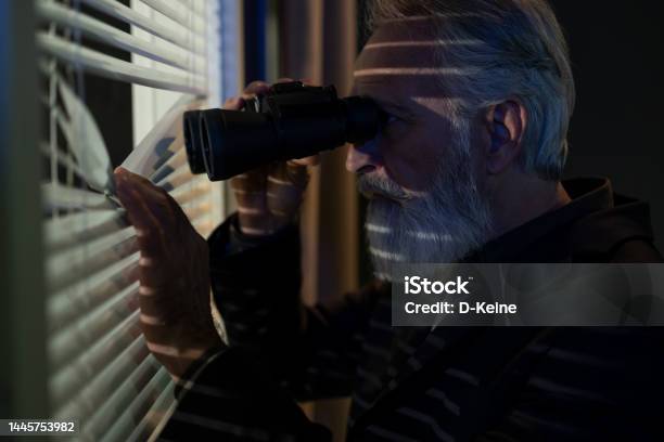 Spy Stock Photo - Download Image Now - Binoculars, Surveillance, 55-59 Years