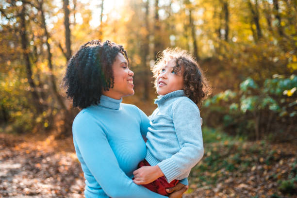 istock Loving Hispanic Mother Embracing Her Multiracial Son 1445757149