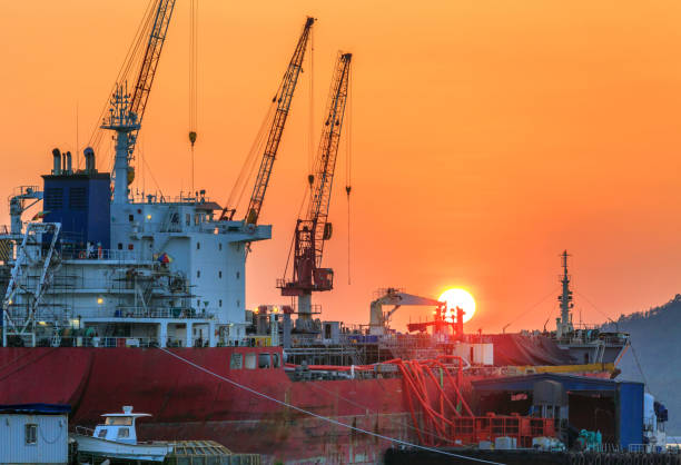 istock the sunset of the shipyard's workshop under construction 1445759389