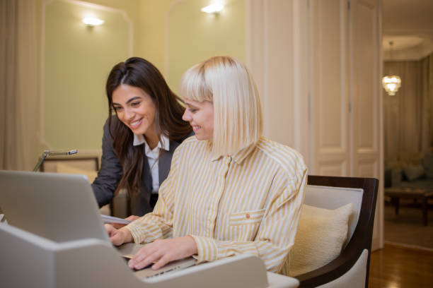 istock Two business colleagues working together 1445763106