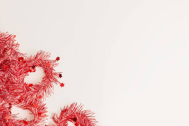 istock creative festive frame with red streamers on white background, top view 1445770773