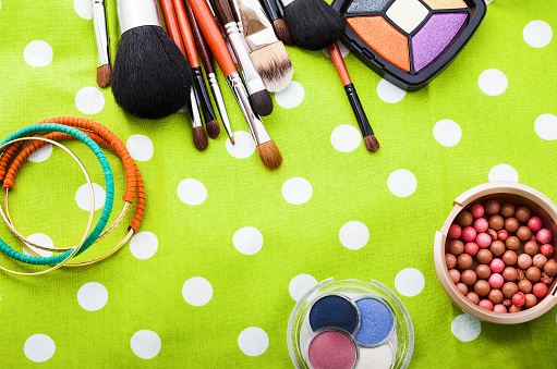 Cosmetics on colorful background. Top view. Copy space