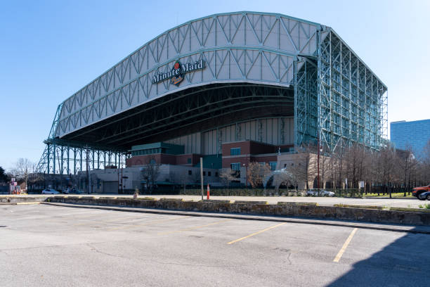 Minute Maid Park stadium building in Houston, Texas, USA. Houston, Texas, USA - February 27, 2022: Minute Maid Park stadium building in Houston, Texas, USA. Minute Maid Park is a retractable roof stadium in downtown Houston. houston astros stock pictures, royalty-free photos & images