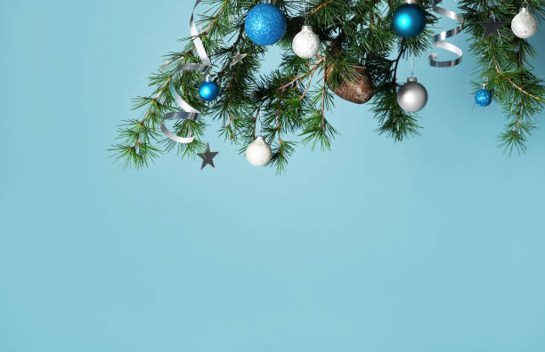 istock Pine branch with Christmas ornament 1445777943