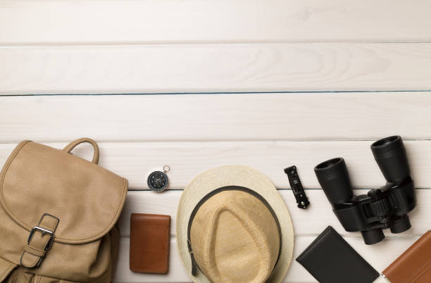 istock Travel accessories for mountain trip on wooden background, top view 1445779021