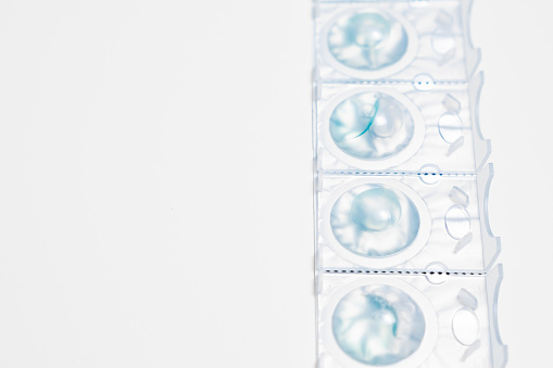 Package of contact eyes on the white background with copy space.