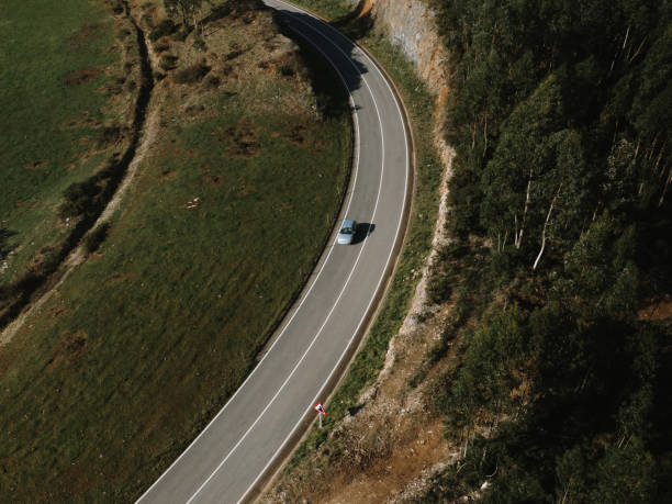 istock Car on a road as seen from above 1445785211