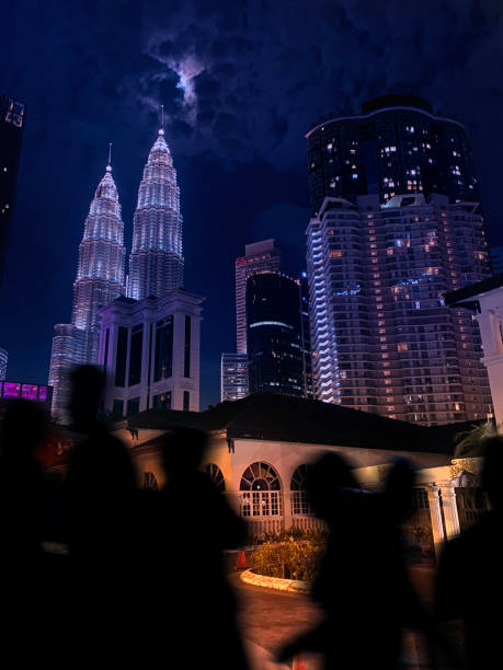 Cityscape with Petronas Towers at night in Kuala Lumpur, Malaysia